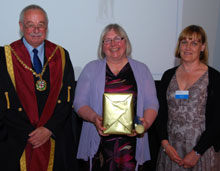 Sue Badger (centre) - presented with the VN Golden Jubilee Award by new VN Council Chairman Kathy Kissick
