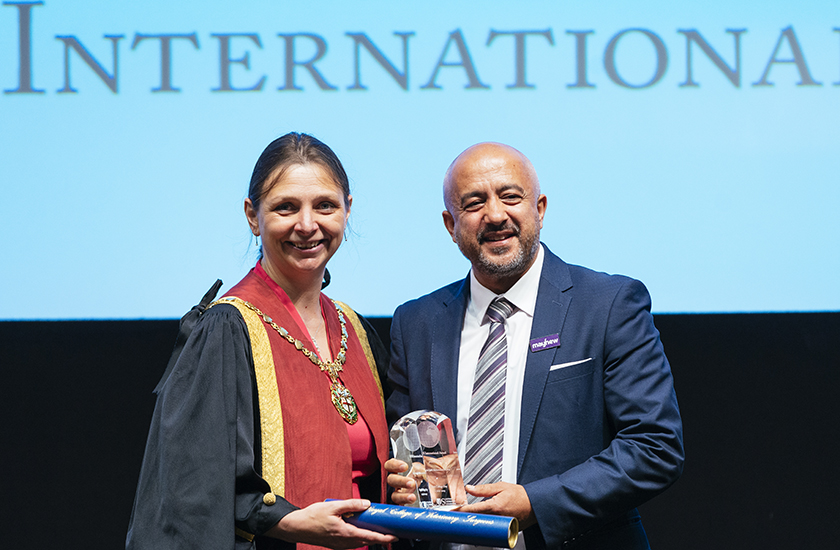 Dr Mo received the International Award from Amanda Boag 
