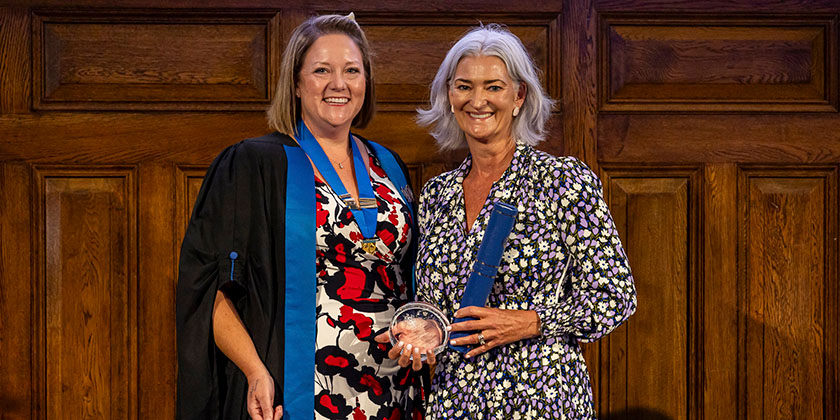 Belinda Andrews-Jones awarding the VN Golden Jubilee Award to Perdita Welsh