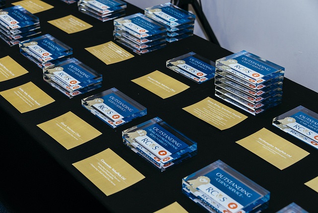 Practice Standards Scheme awards on a table