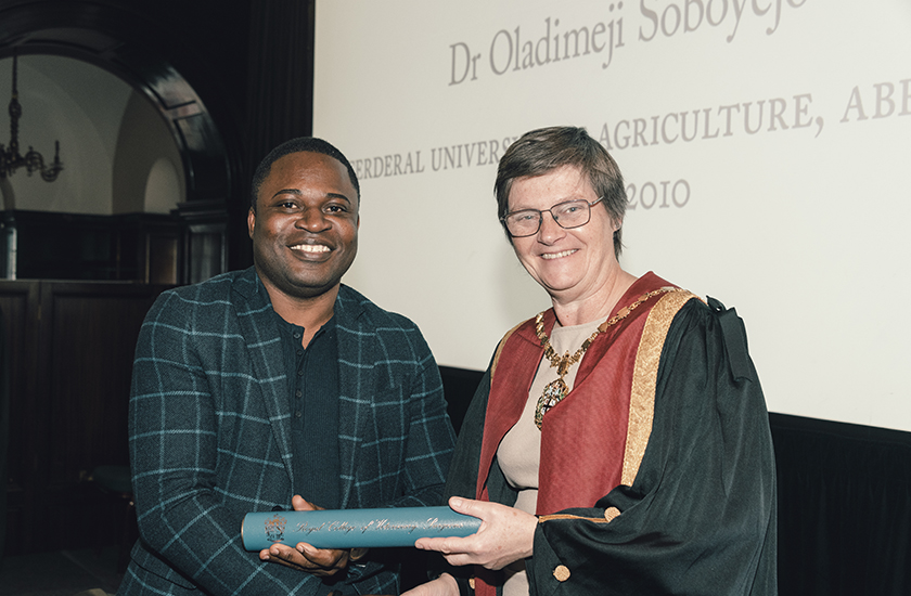 Dr Oladimeji Sobeyo MRCVS with RCVS President Dr Sue Paterson FRCVS at the Stat Exam ceremony on 24 October 2023 