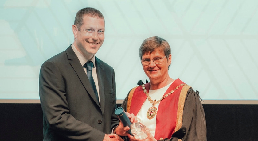 Sue Paterson presenting the Compassion Award to Timothy Sandys at RCVS Day 2024
