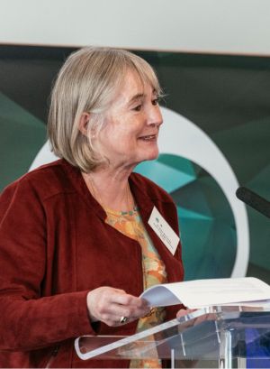 Dr Kate Richards speaking at a lectern