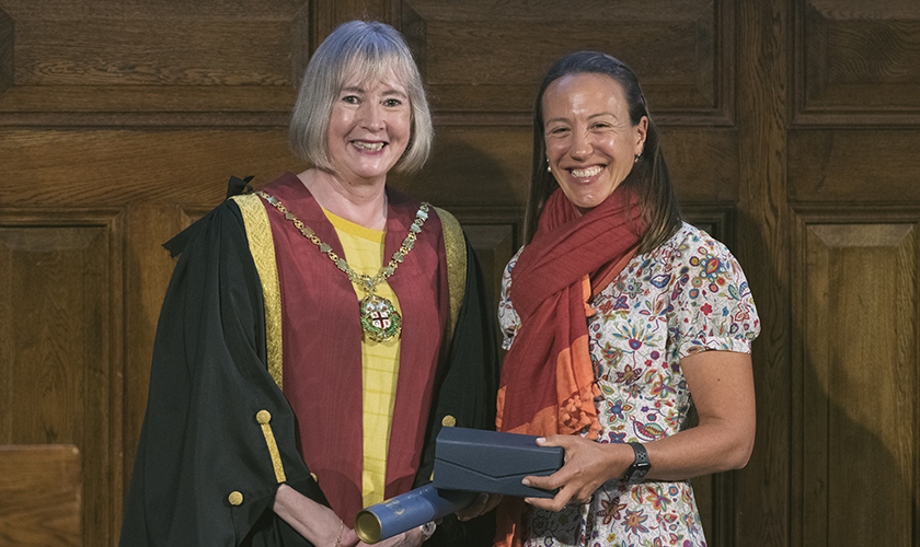 Katie Moore receives the RCVS Compassion Award from Kate Richards at Royal College Day 2022 