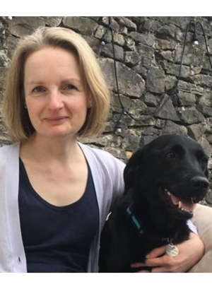 Professor Elinor O'Connor picture with her black labrador