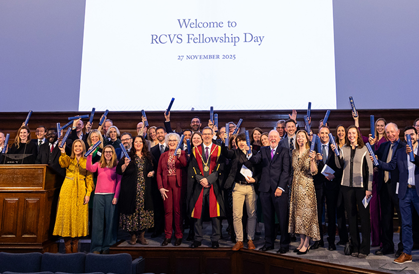 RCVS President Professor Tim Parking FRCVS on stage with new Fellows at Fellowship Day 2025 
