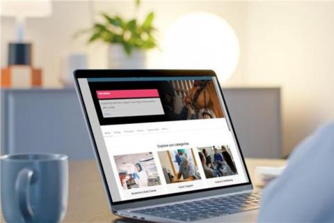 Image of the RCVS Academy platform on a computer screen with a blue mug next to it